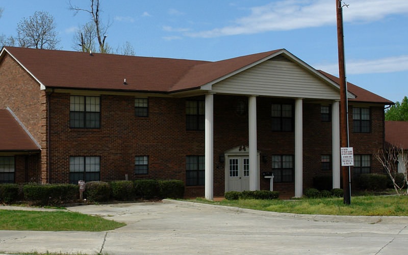 exterior shot of 4 column community building